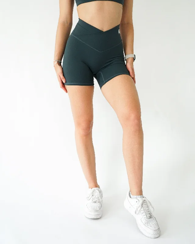 Flexibility Meets Affordability In Our Yoga Wear Sale Impact V-Waist Biker Shorts 6” - Emerald Flexibility Meets Affordability In Our Yoga Wear Sale Impact V-Waist Biker Shorts 6” - Emerald