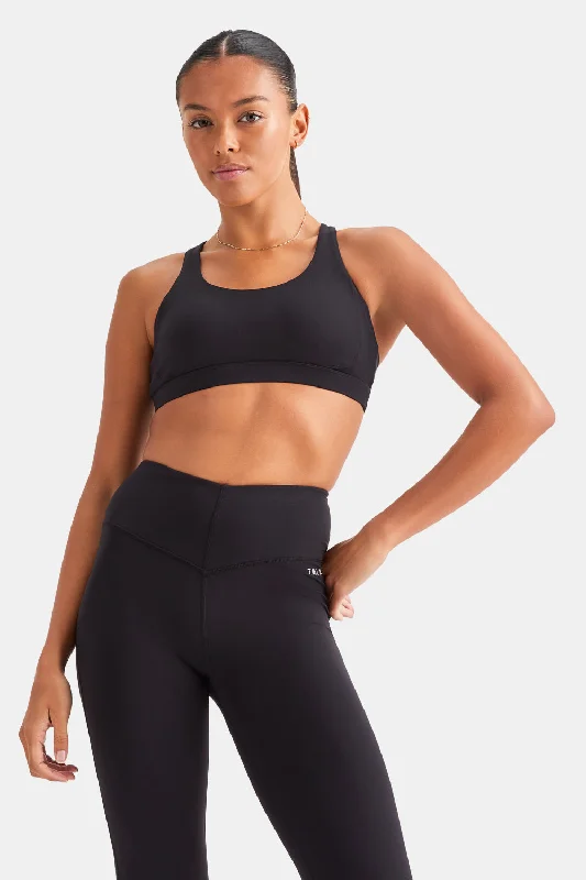 Stretch Your Limits, Not Your Wallet SKINLUXE TANK SPORTS BRA - SHADOW BLACK